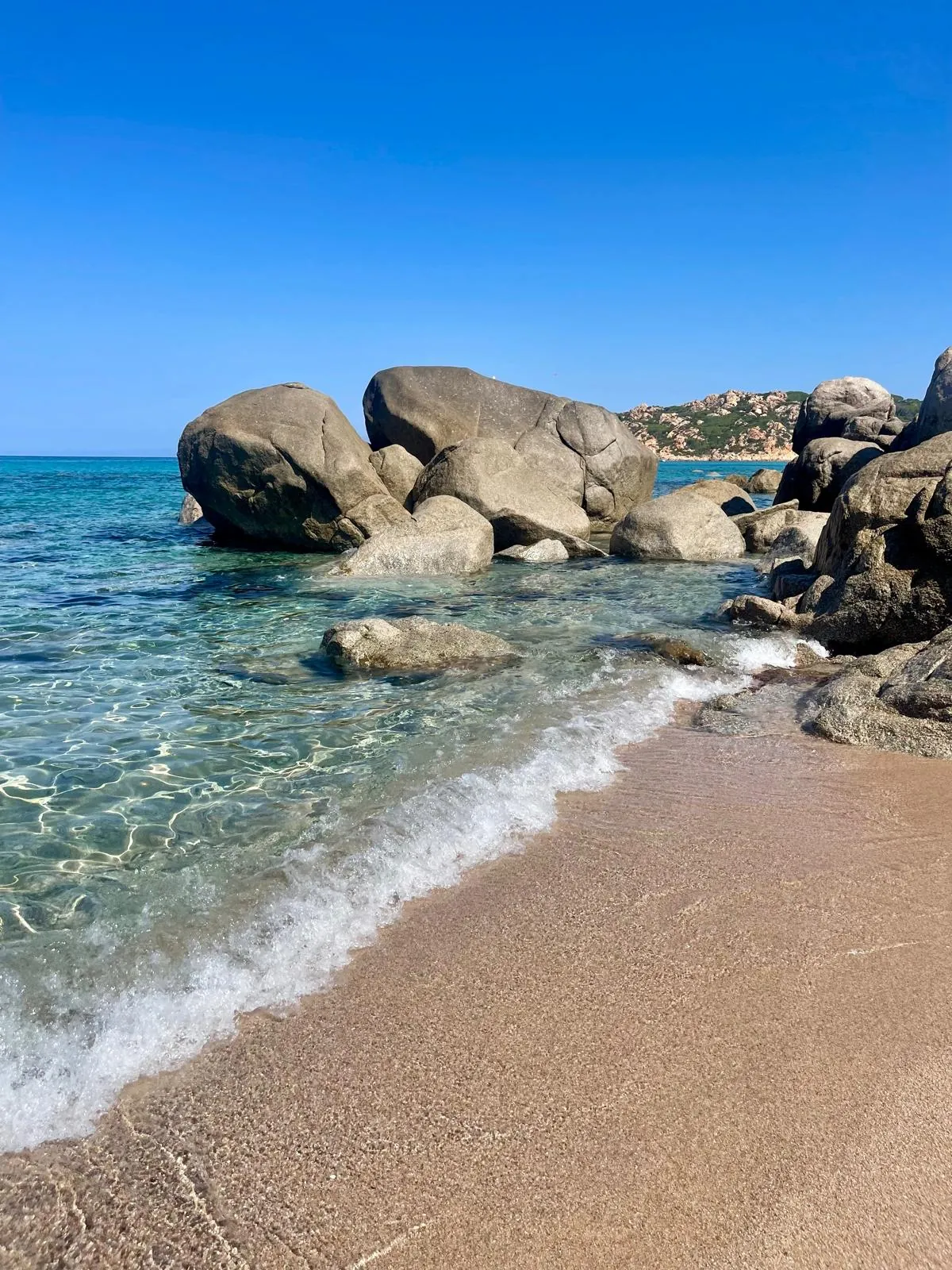 Granite boulders in clear water